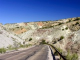 Colorful Morrison shale beds, tilted and eroded in a seemingly chaotic pattern,  West Dinosaur NP