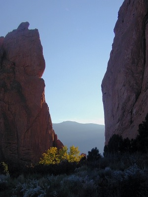 Gateway Rocks at Garden of the Gods frame the broad summit of Pikes Peak