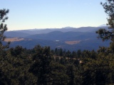 Eocene erosional surface sloping east below Pikes Peak, from Genesee Mountain, visible light