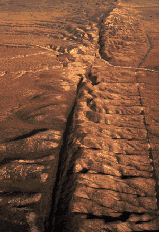 San Andreas Fault, a tranform boundary crossing the Carizzo Plain, central California; photograph by Robert E. Wallace, USGS