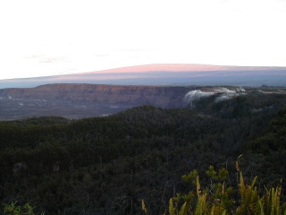 Mauna Loa towering above Kilauea caldera in morning light looking north from Volcano House. [C-2020Z]